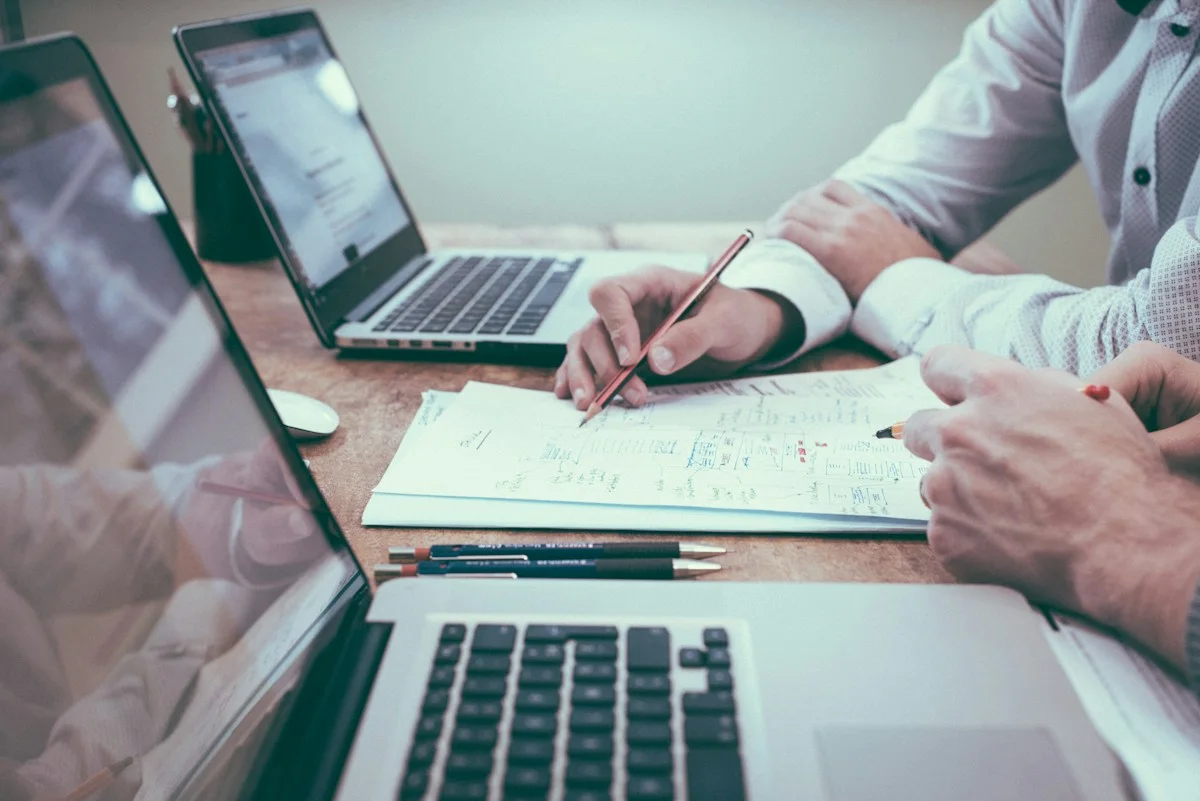 Financial reports being reviewed during a business planning discussion